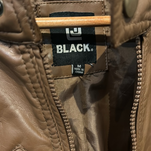 Bomber/cycle jacket. Size medium brown with gray sweatshirt like hoody layer. - Picture 2 of 3